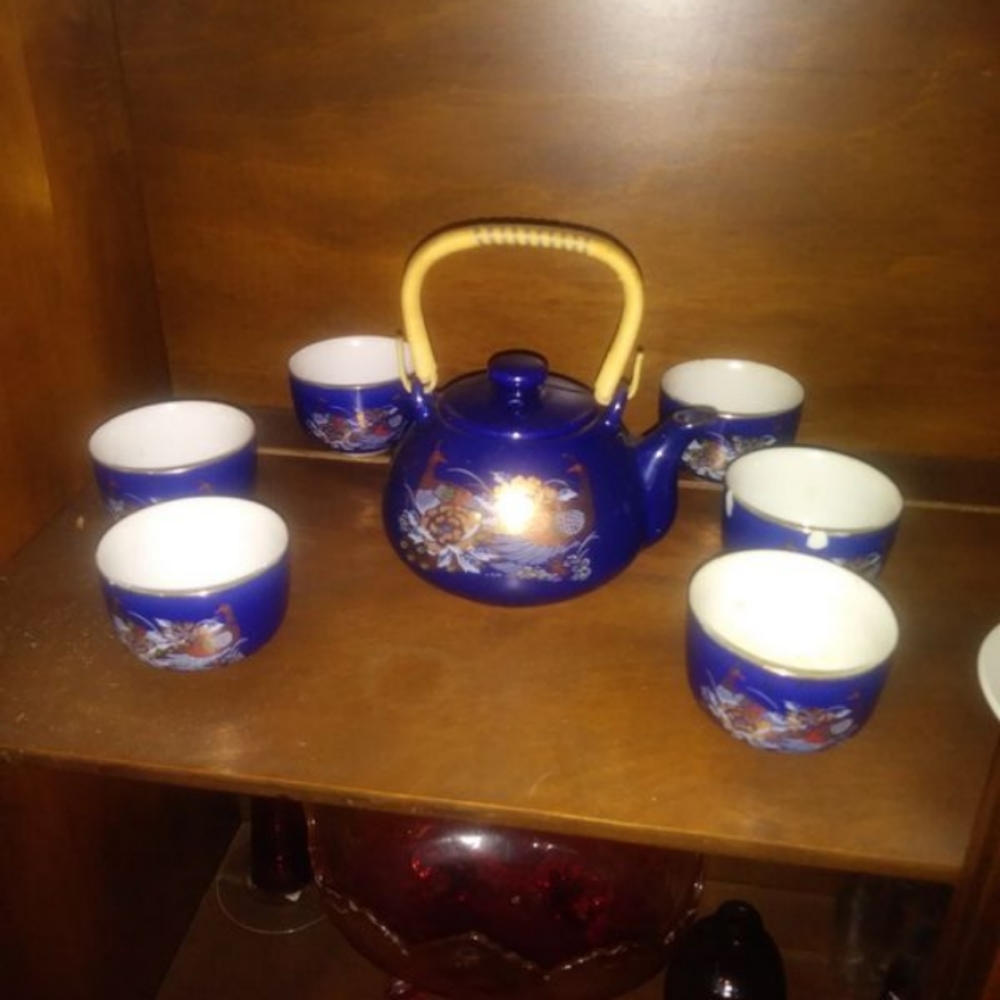 Blue teaset with gold design great condition
